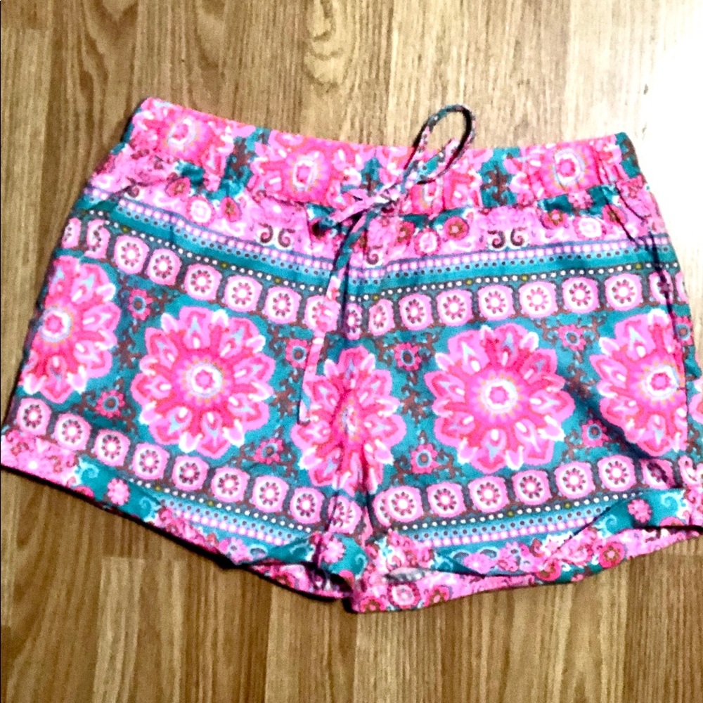 Ladies pull up shorts with drawstrings.
